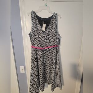 Elegant Black and White Patterned Dress with Pink Accent